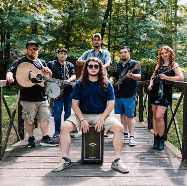 The Creekers band image outdoors on bridge