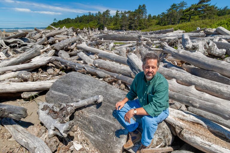 Kirby Stephens at the shoreline of the Pacific Ocean