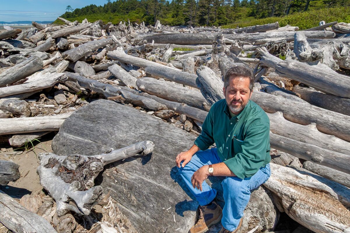 Kirby Stephens at the shoreline of the Pacific Ocean
